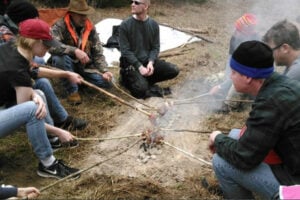 Cooking food over hot coals