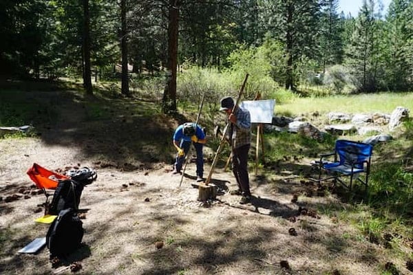 Advanced students chopping out bow staves. "