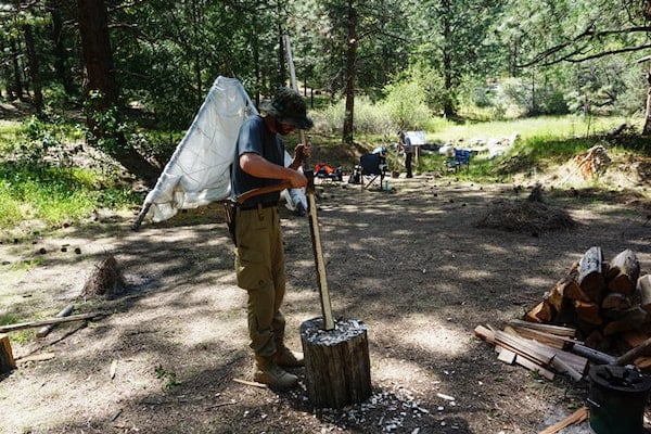 Ben using ax to shape quick bow."