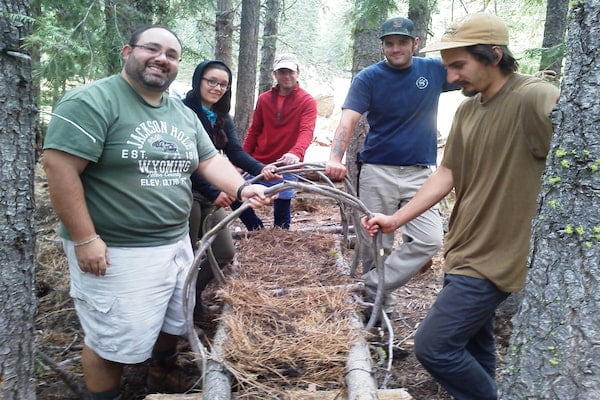 Students learning shelter craft."