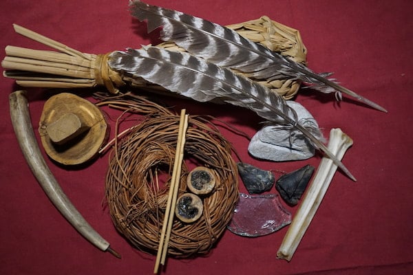 Sticks, stones, bones, feathers, roots, for survival tools.