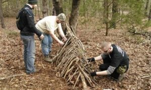 The frame or skeleton of the Debris Hut is made from sticks of different sizes. The frame or skeleton of the Debris Hut is made from sticks of different sizes.